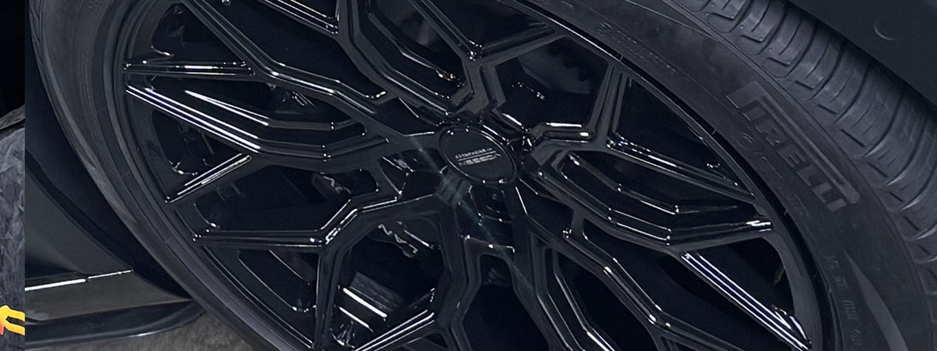 Close-up of a custom aftermarket wheel installed as part of a vehicle restyling project