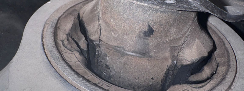 Failed rubber bushing on a Tesla Model 3 lower control arm